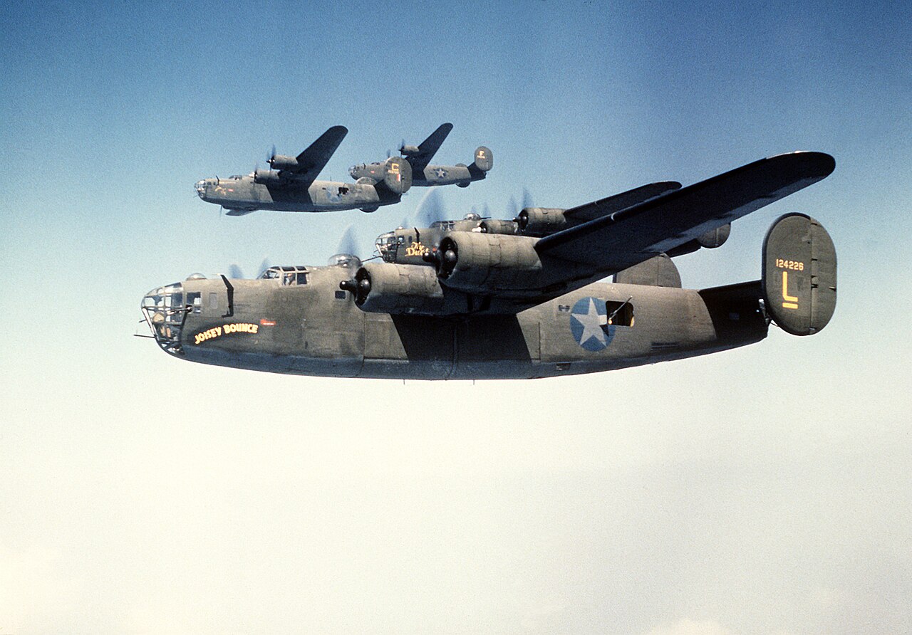 In circa 1943, U.S. Army Air Forces Consolidated B-24D Liberators belonging to the 93rd Bomb Group were captured in a photograph while flying in formation. Among the depicted aircraft are the following: B-24D-25-CO (serial number 41-24226) named "Joisey Bounce" (later renamed "Utah Man"), assigned to the 330th Bomb Squadron, which tragically collided midair with 42-40765 on November 13, 1943, during a mission to Bremen, Germany. The aircraft crashed near Husum, Germany, resulting in 8 fatalities and 2 prisoners of war (documented under MACR 2179). Another aircraft, B-24D-20-CO (serial number 41-24147) known as "The Duchess" or "Evelyn the Duchess," also of the 330th Bomb Squadron, was shot down over Herzheim, Germany, on February 25, 1944, resulting in 2 fatalities and 8 prisoners of war (documented under MACR 2924). Additionally present is B-24D-1-CO (serial number 41-23722) named "Boomerang" and B-24D-40-CO (serial number 42-40246) known as "Thunder Mug," both belonging to the 328th Bomb Squadron.